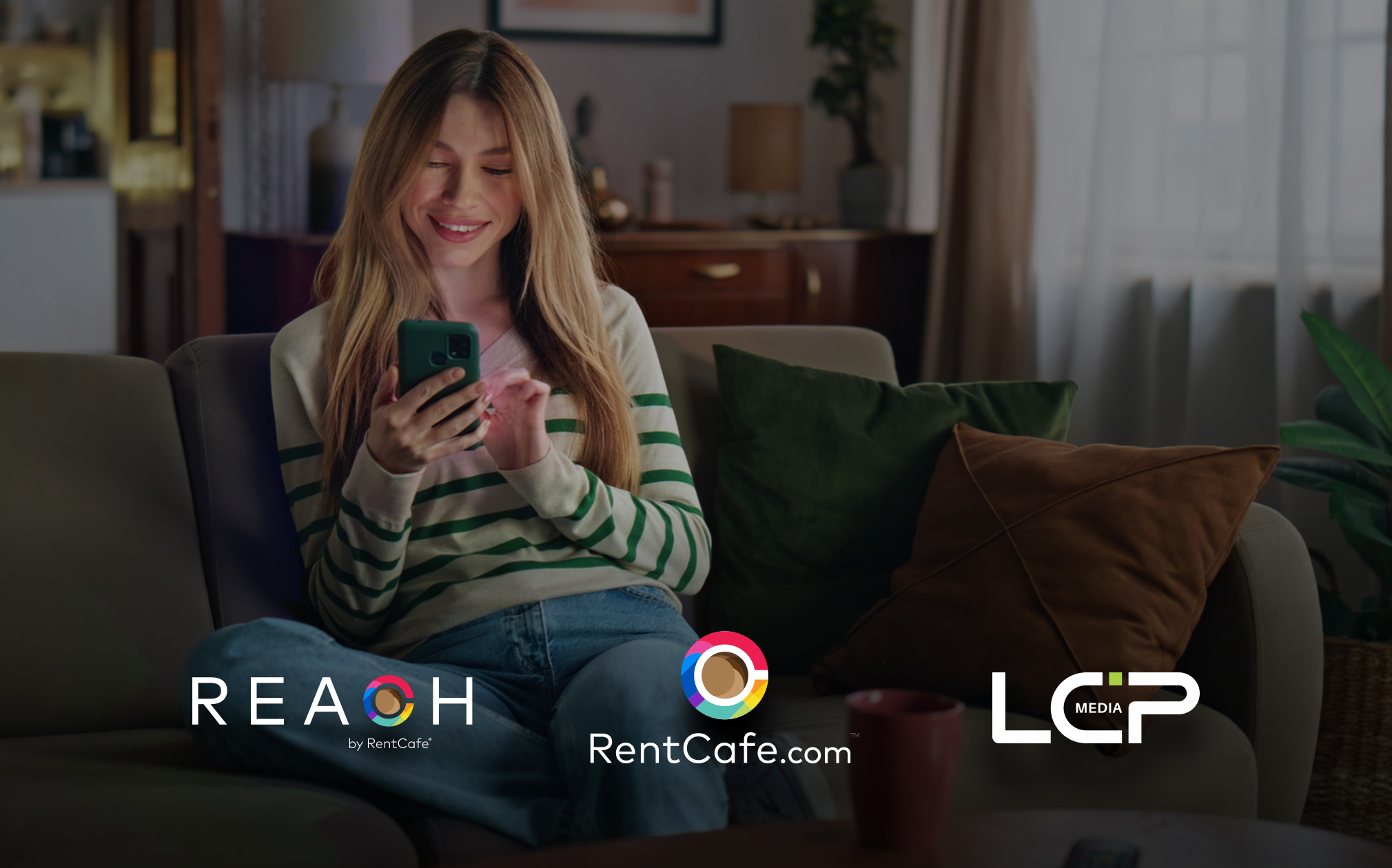 woman scrolling on a mobile phone in an apartment with the REACH by RentCafe, RentCafe.com and LCP Media logos below